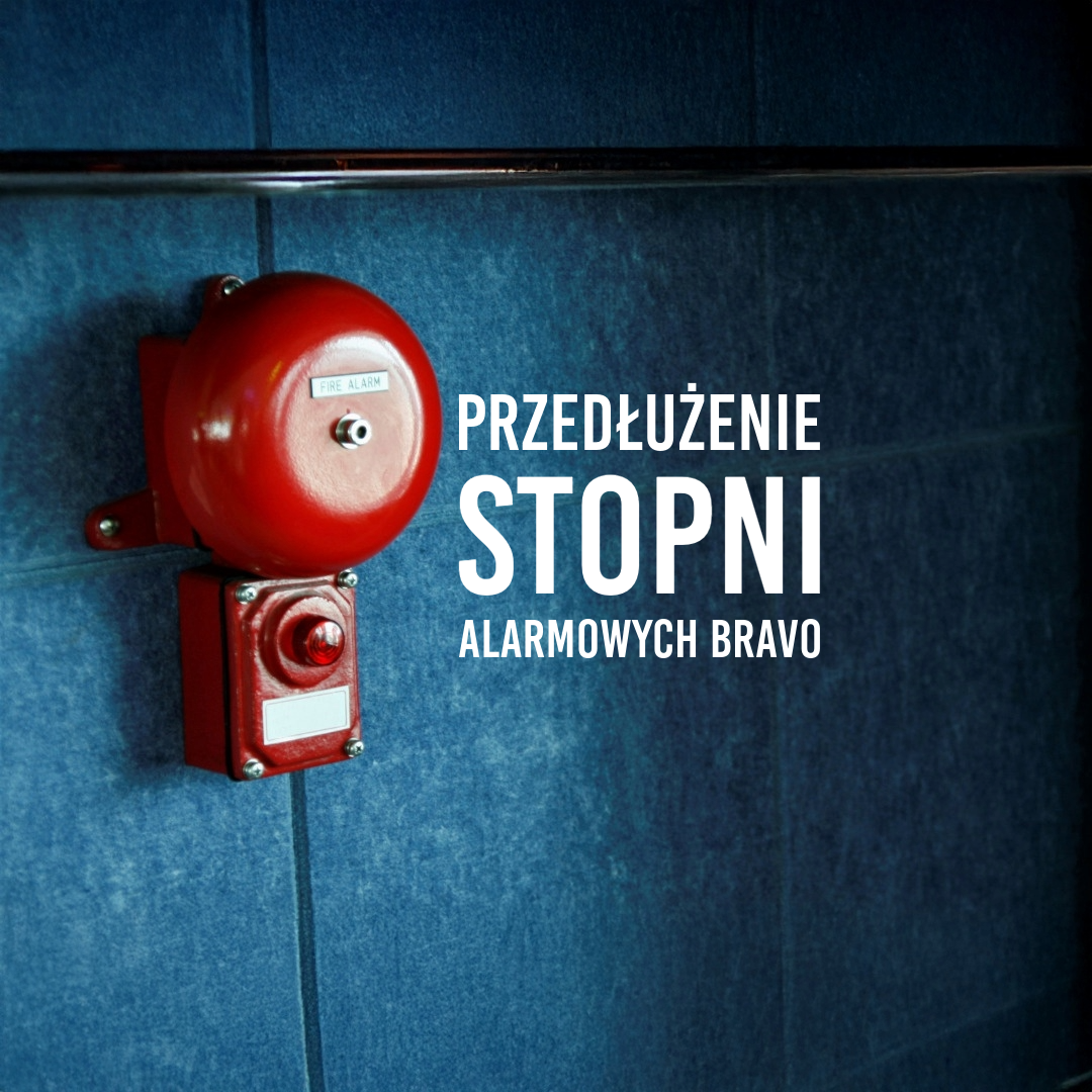 grafika - dzwonek alarmu plus napis przedłużenie stopni alarmowych bravo